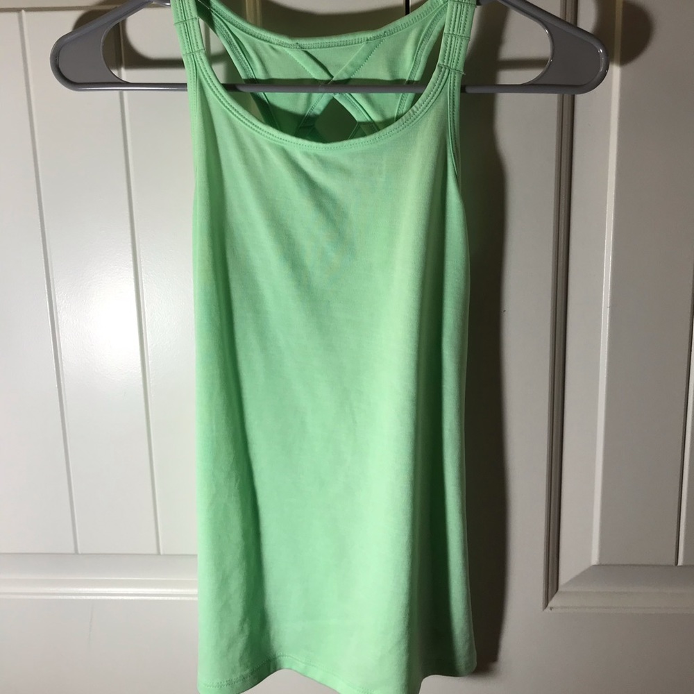 Workout tank top. Comfy when wearing. Green. Kids